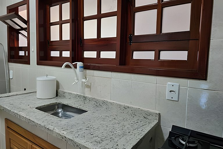 No pé da igreja Praia da Vila Entre o mar e lagoa.