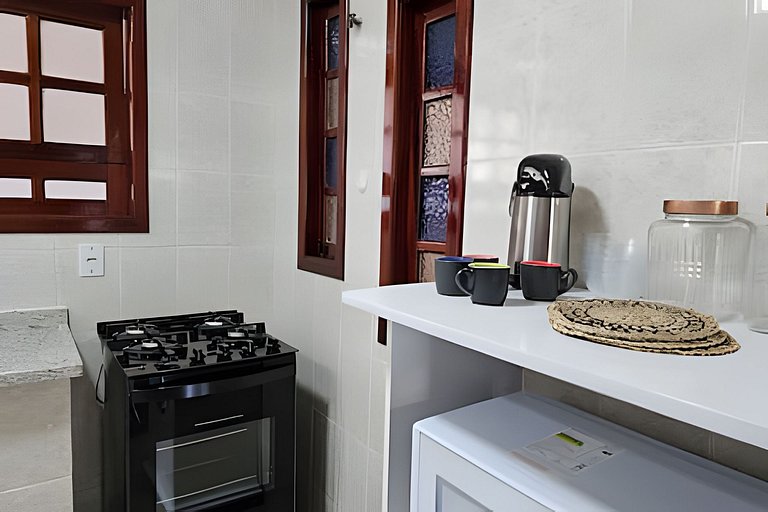 No pé da igreja Praia da Vila Entre o mar e lagoa.