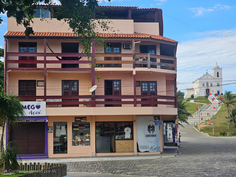 No pé da igreja Praia da Vila Entre o mar e lagoa